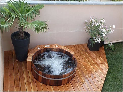 Finished hot tub in gorgeous cedar enclosed decking