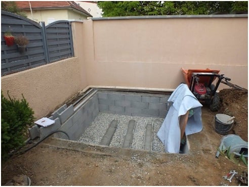 Building retention wall and proper drainage as well as support for hot tub